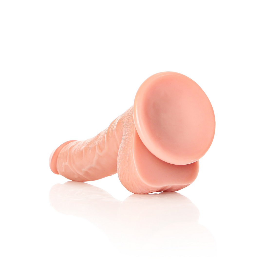 Gekrümmter realistischer Dildo mit Balls und Saugnapf - 7 / 18 cm